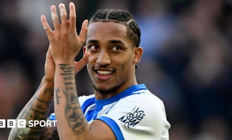 Joao Pedro applauds while playing for Brighton